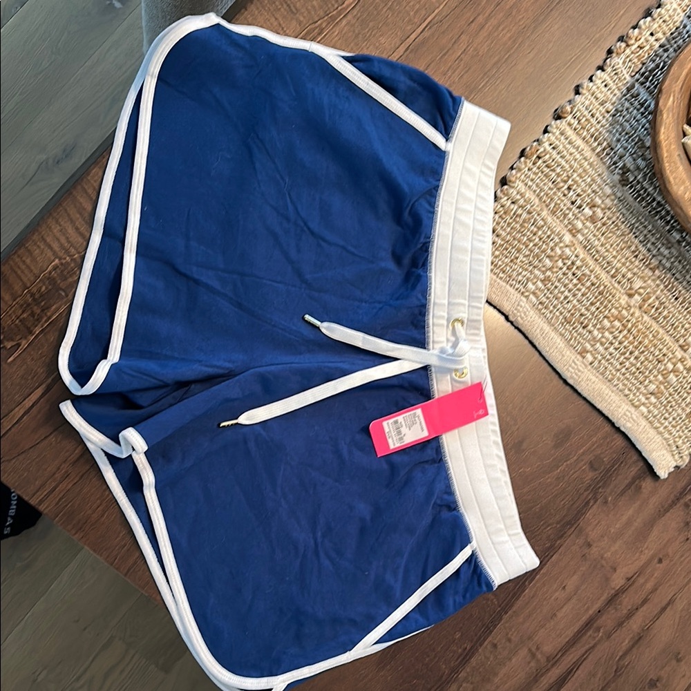 Blue Athletic Shorts with White Trim